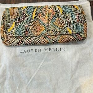 Lauren Merkin Caroline snakeskin clutch with dust bag.